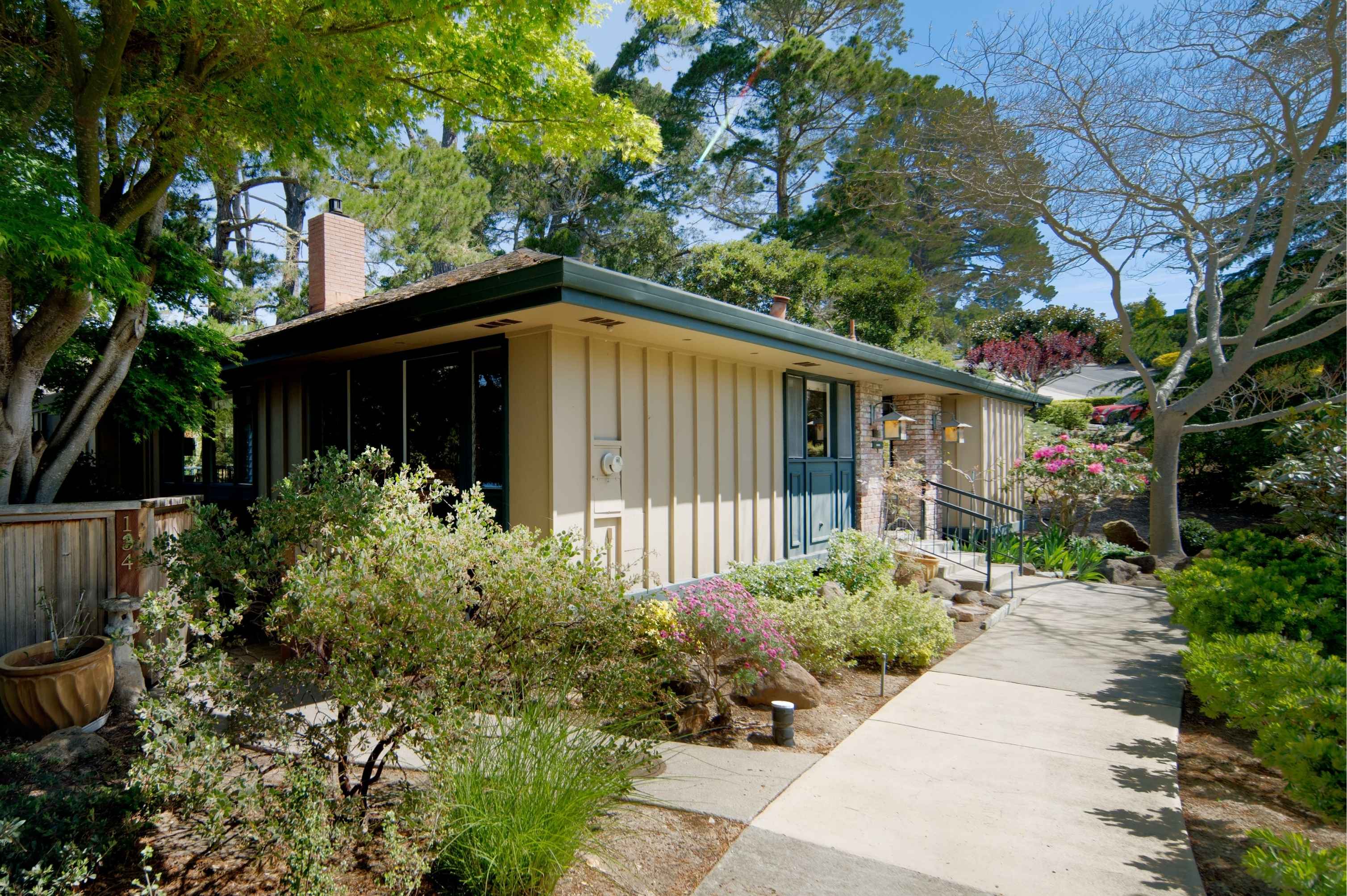 A sun-lit luxury residence in the Miramonte area of Carmel Valley, showcasing the vibrant spring market and resort-style living near Bernardus Lodge.