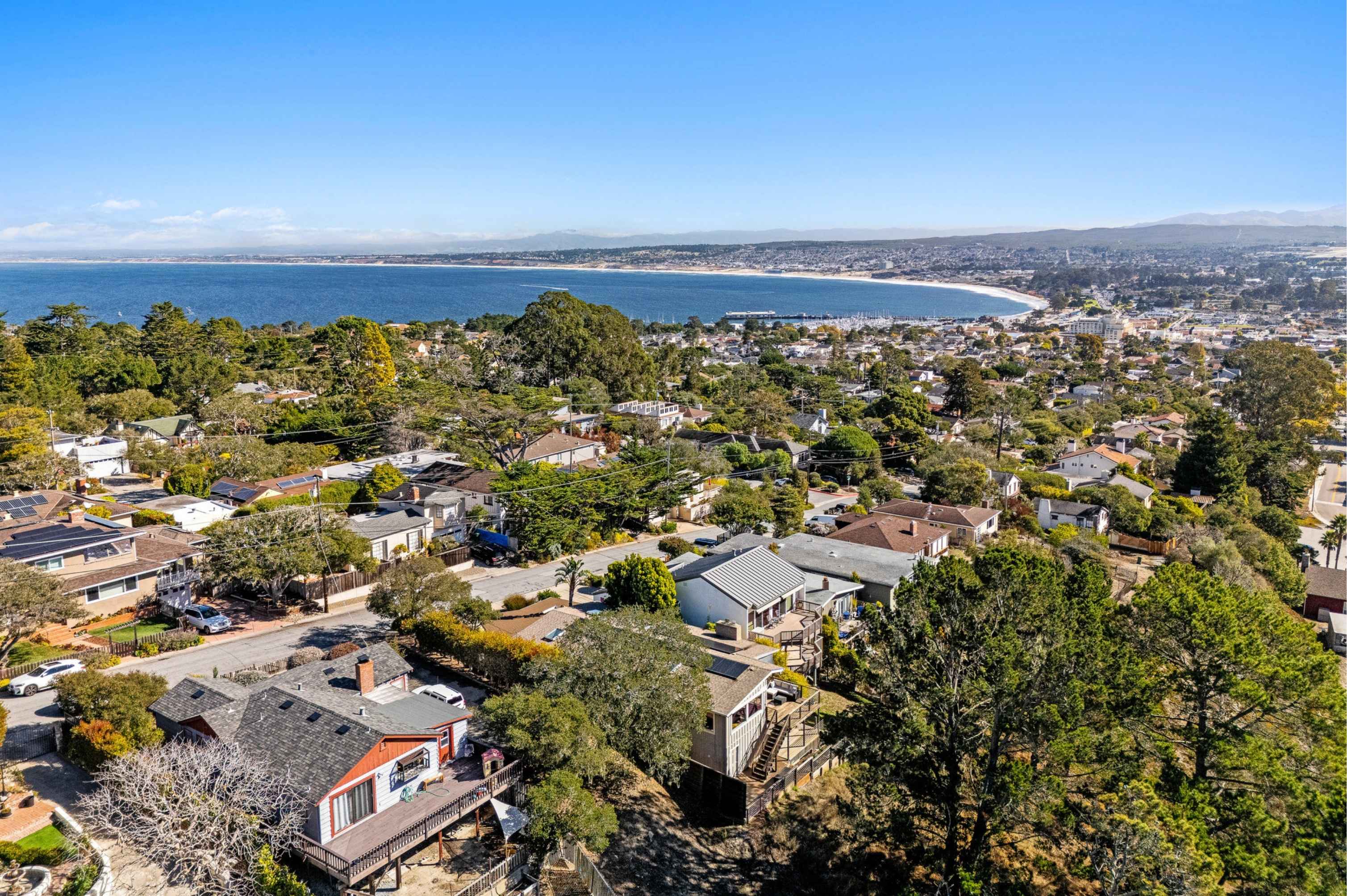 An elegant Carmel residence with sweeping views toward Point Lobos, perfectly capturing the brisk, clear beauty of the winter season.