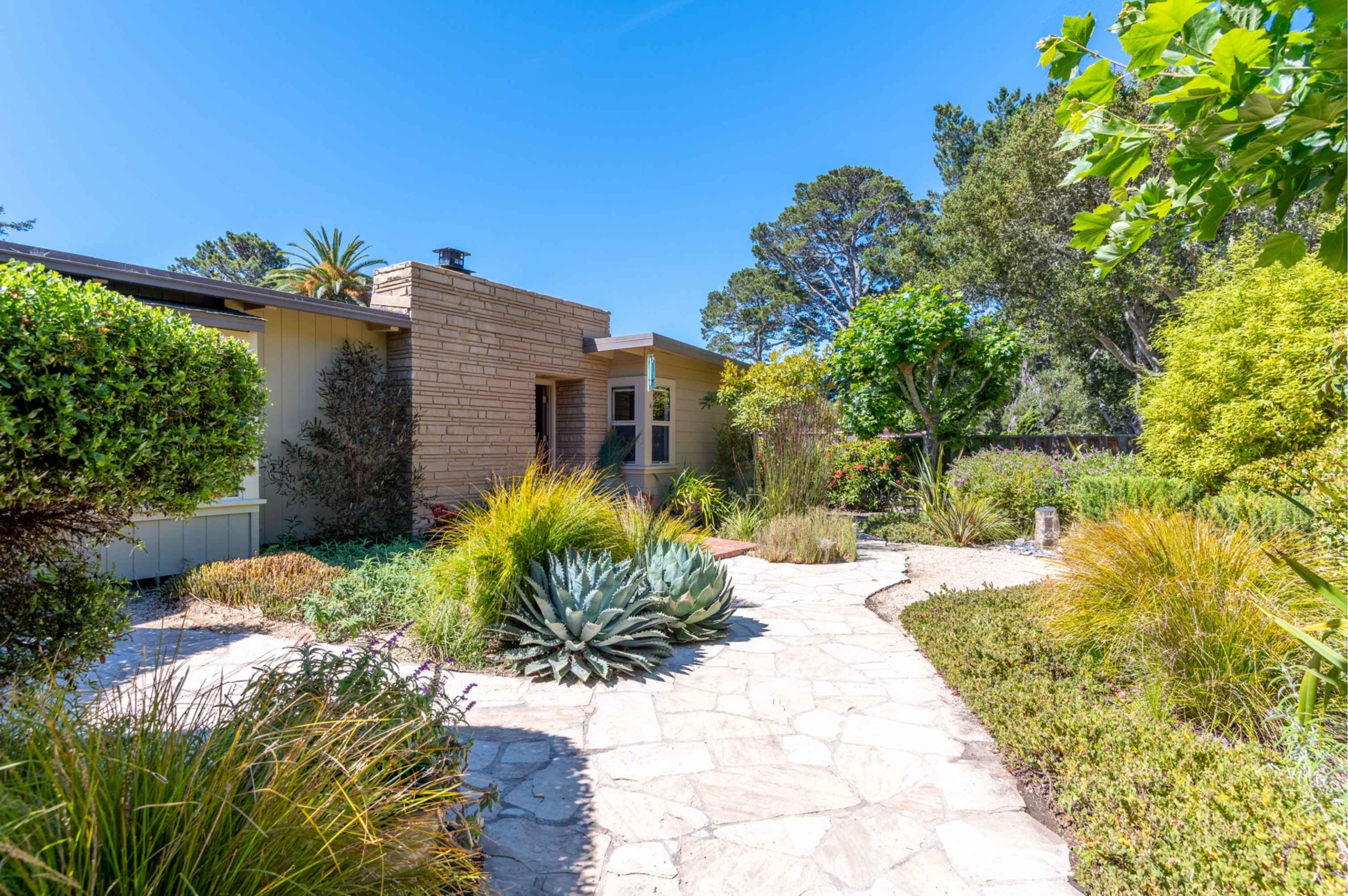 A stunning sun-drenched estate in Carmel Valley, reflecting the 'quintessential rancher' style and the vibrant market movement of early 2015.