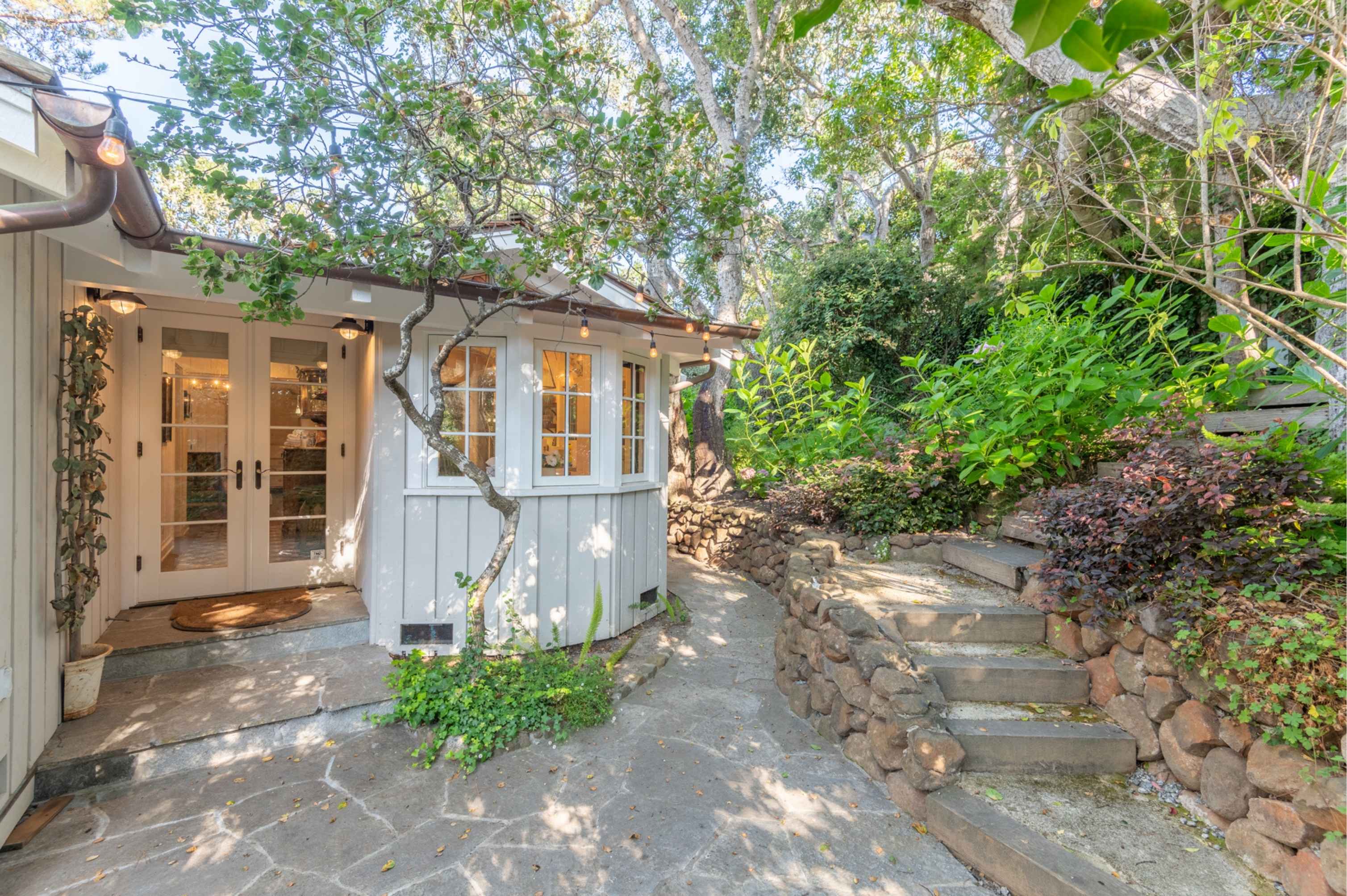 A prime luxury home in Carmel-by-the-Sea, representing a stable 'real asset' in a shifting interest rate environment.