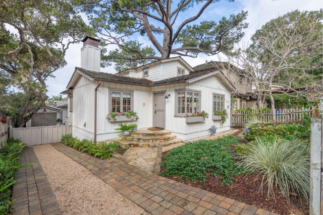 Front exterior of meticulously renovated luxury cottage at Casanova 3 NW 9th St in Carmel.