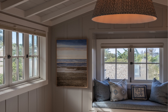 Built-in window seat and reading nook with abundant natural light at the Casanova 3 NW 9th St property.