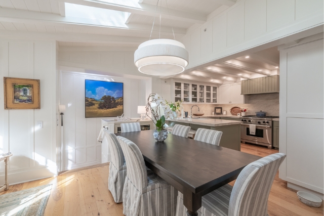 Formal dining area open to the fully renovated chef's kitchen in Golden Rectangle luxury home.